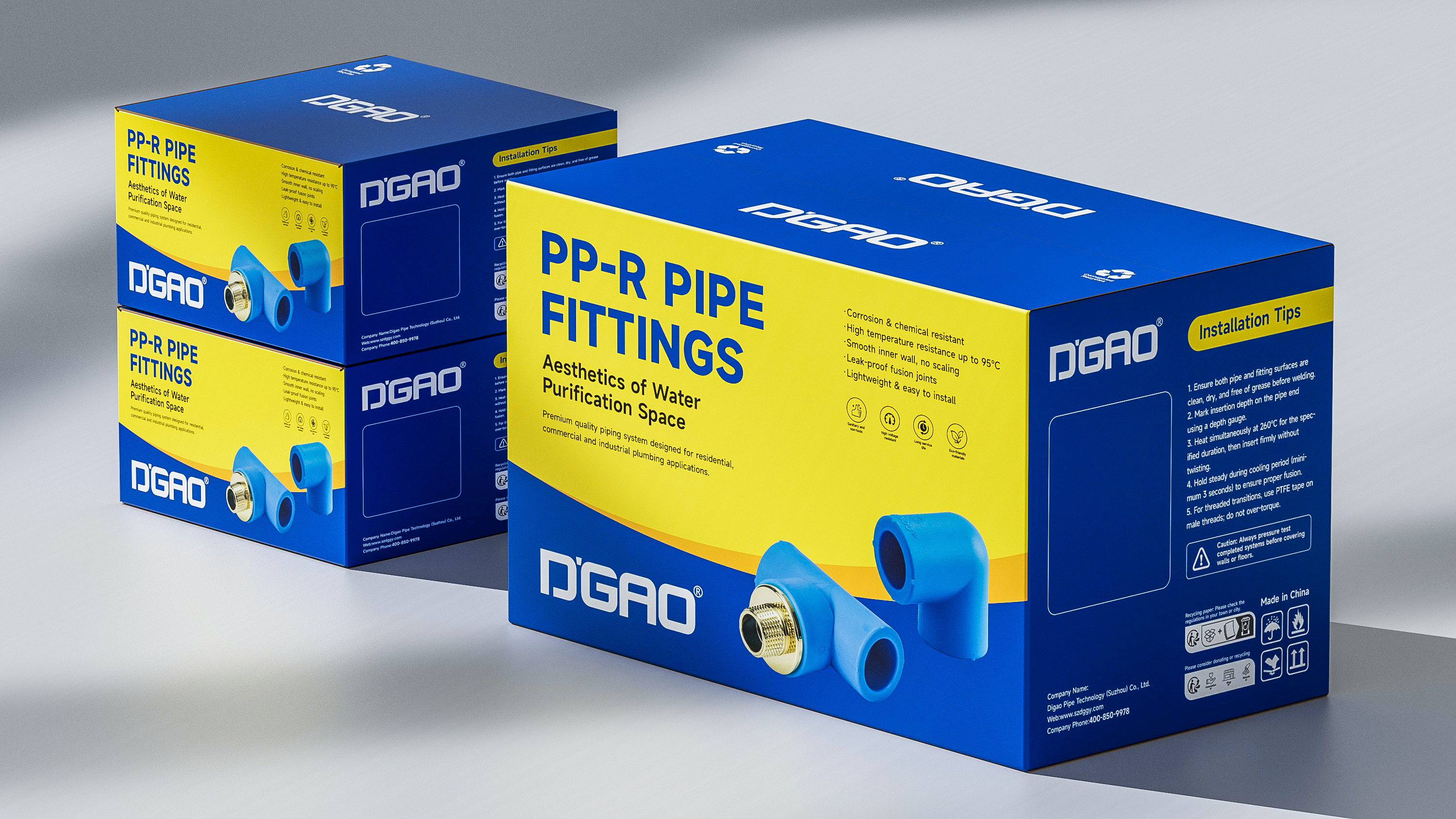 Stacked DIGAO branded PP-R pipe fitting cartons showing printed installation tips and product imagery